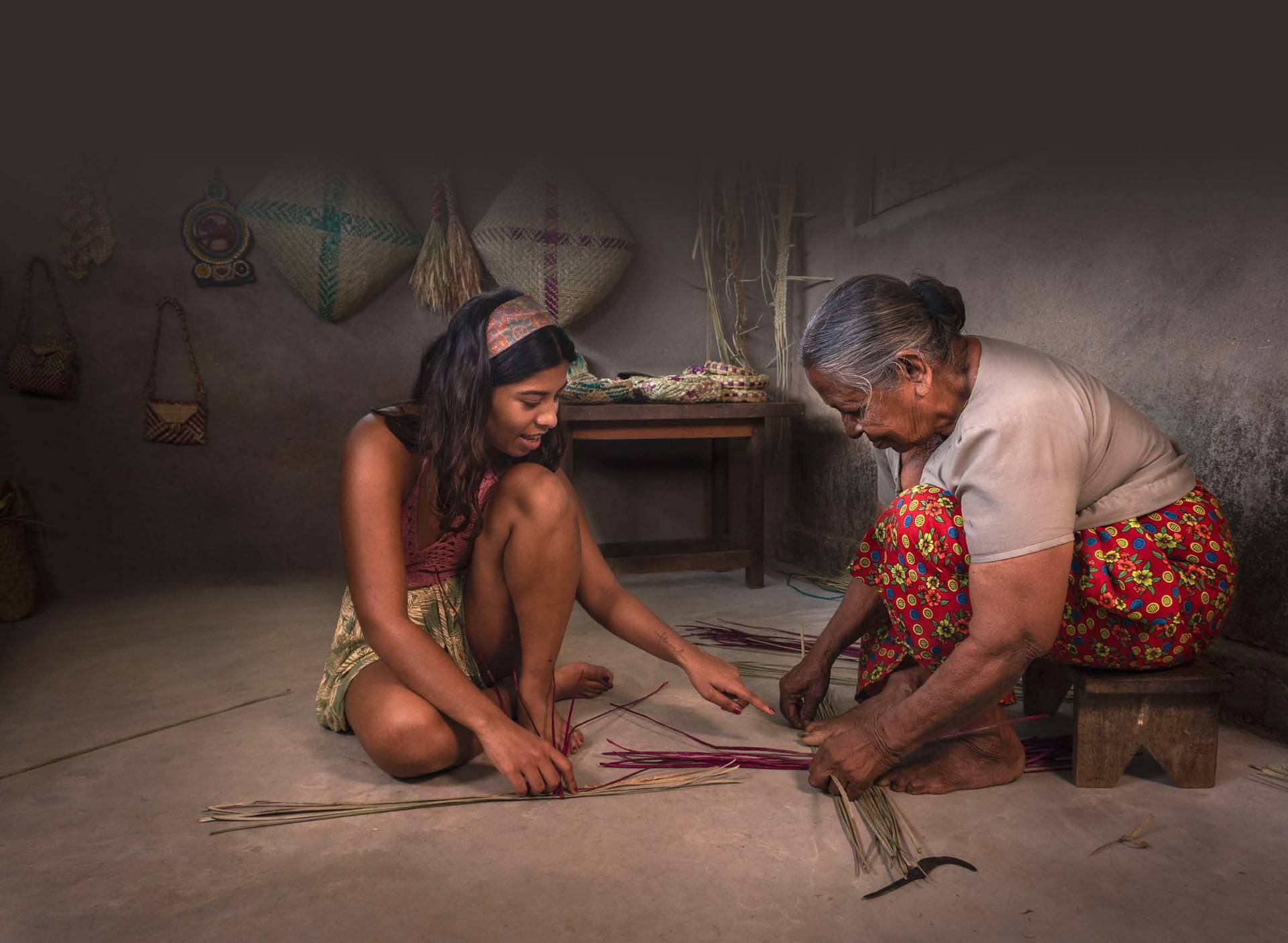 Aruni weaving traditional textiles in Kandy with her grandmother